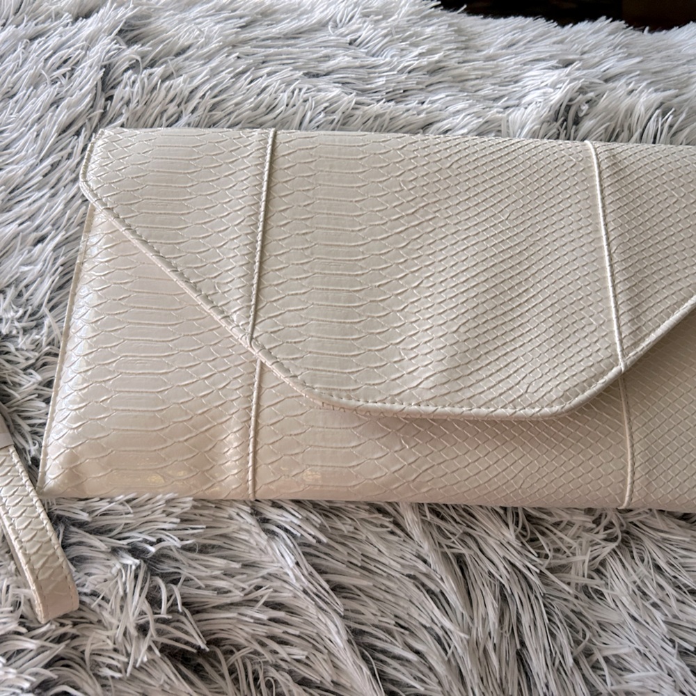 Large Bella Collection clutch with snap strap